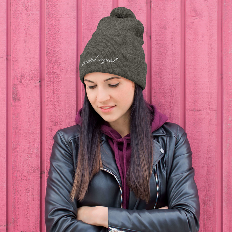 Expand your wardrobe with a classic embroidered beanie. Finished with a pom-pom on top, it offers tons of warmth and comfort, and is destined to find its way into all your favorite cold-weather looks.

• 100% acrylic
• 12″ (30.5 cm) knit
• Fold-over 3″ (7.6 cm) cuff
• Pom-pom on top
• One size fits most
• Blank product sourced from Vietnam
