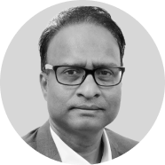 Black and white headshot of Anand Attuluru