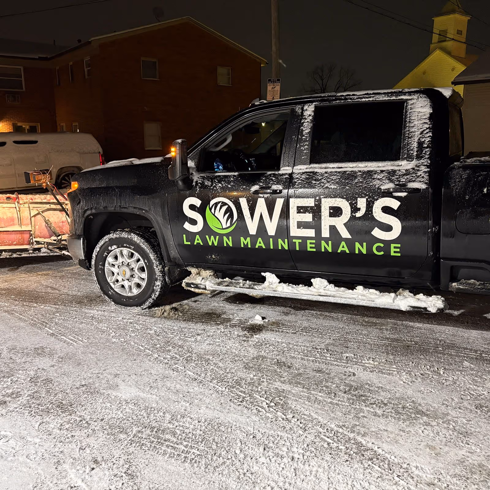 Sower’s Lawn Maintenance truck and team ready for service call in Englewood