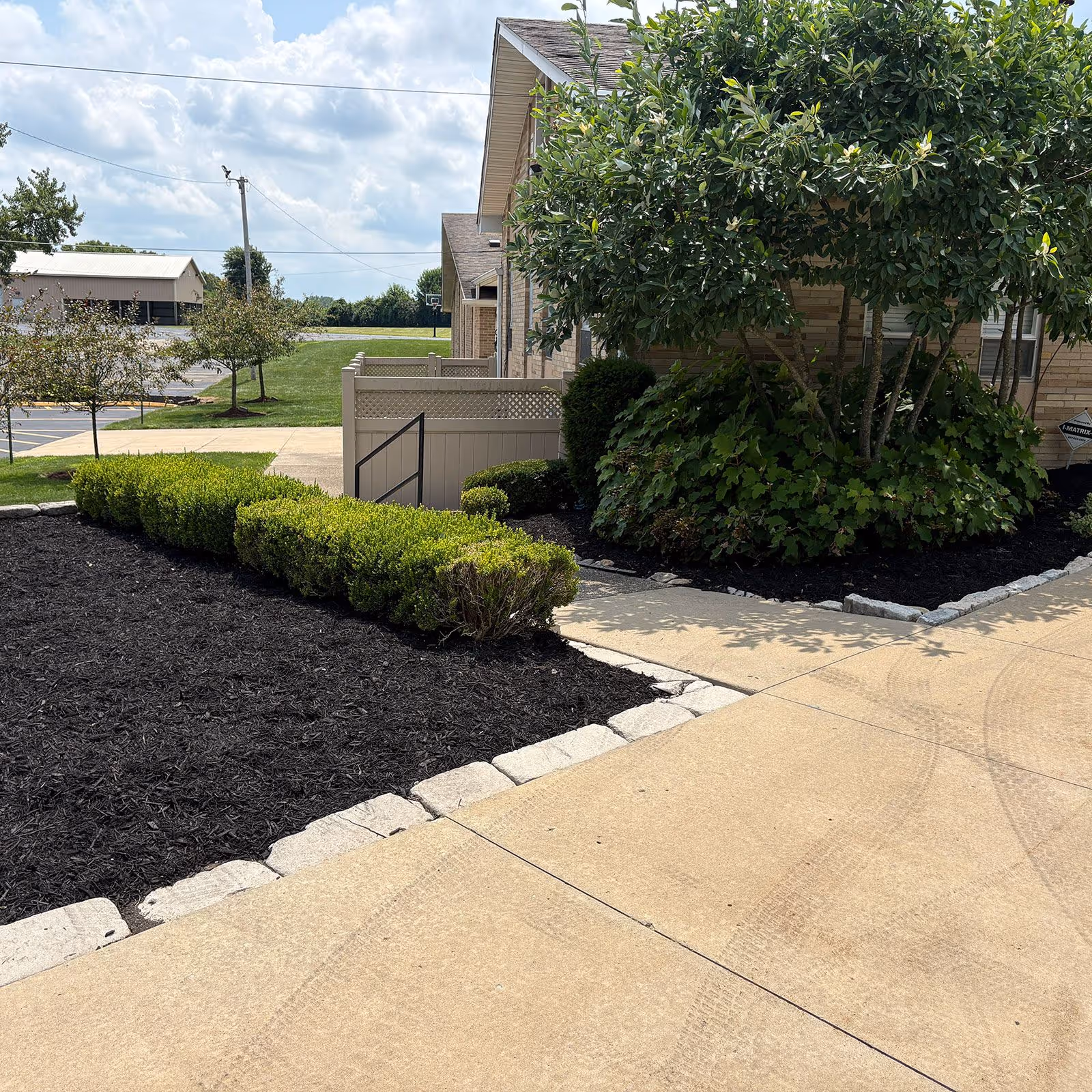 Softscaping upgrade with mulch improving overall yard appearance