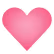 Pink heart shape with a subtle gradient and a small white highlight on the upper left side.
