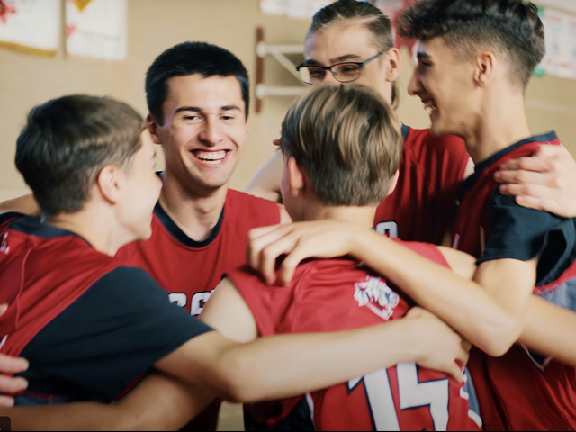 Basketball team celebrating