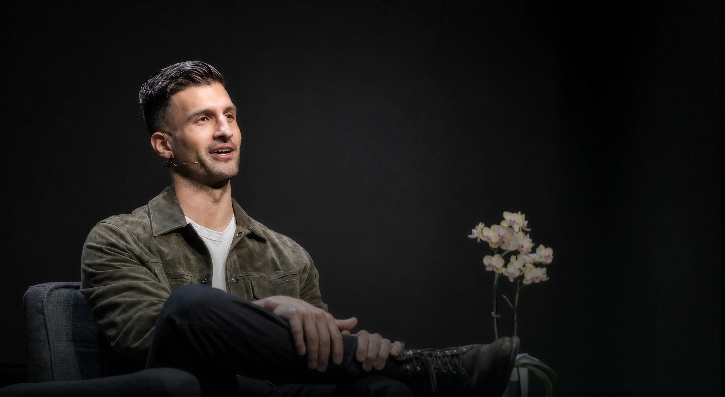 Sahil Bloom seated, looking to the right