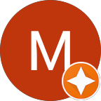 White letter M on a rust-colored circle with an orange and white star badge at the bottom right.