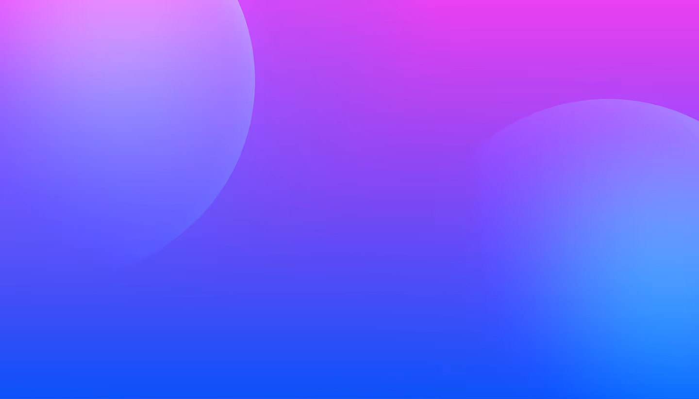 Abstract gradient background with large soft purple and blue circular shapes blending into pink and blue hues.