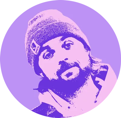 A circle with a portrait of Bee in the center