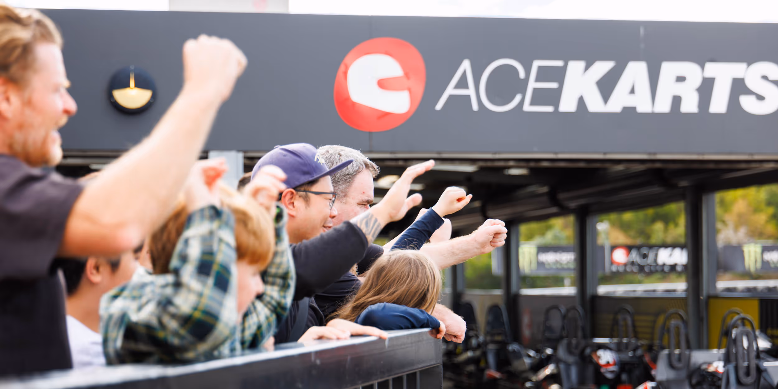 Participants at a go kart fundraising event at Ace Karts.