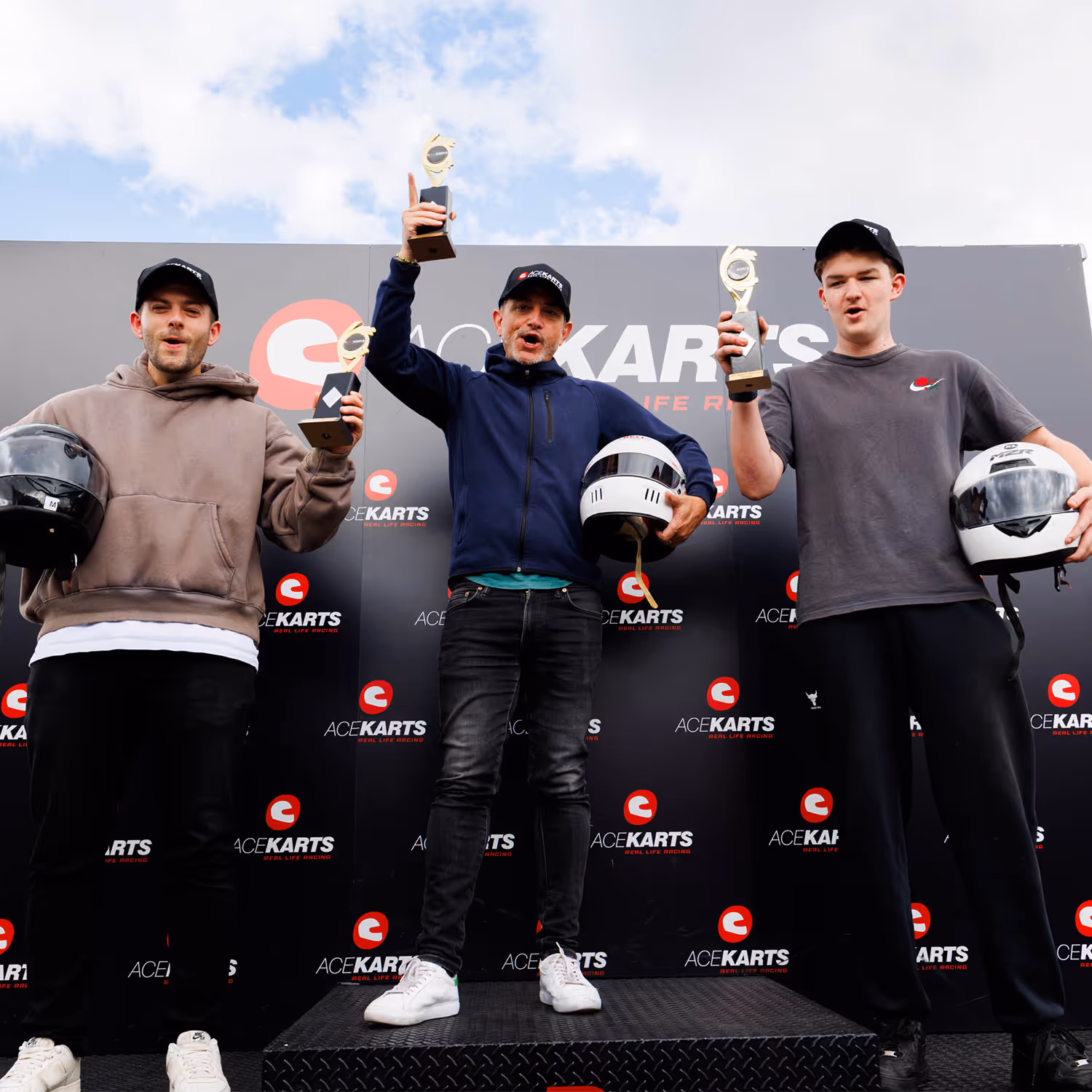 Corporate event group outside Ace Karts after a go kart session.