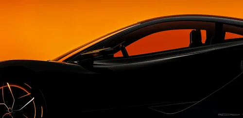 car with neon orange background