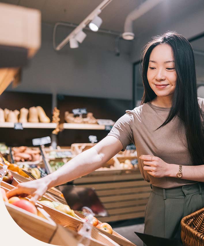 a woman grocery shopping