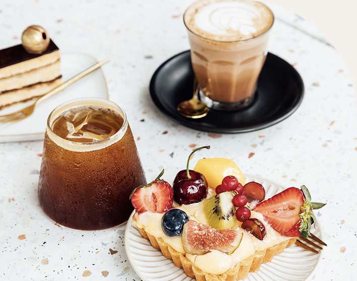 a coffee and cake at Cache Cache cafe