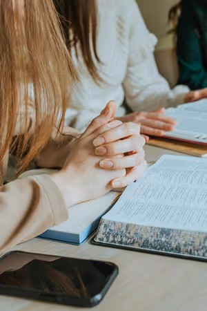 Coming before God together in faith and expectation.