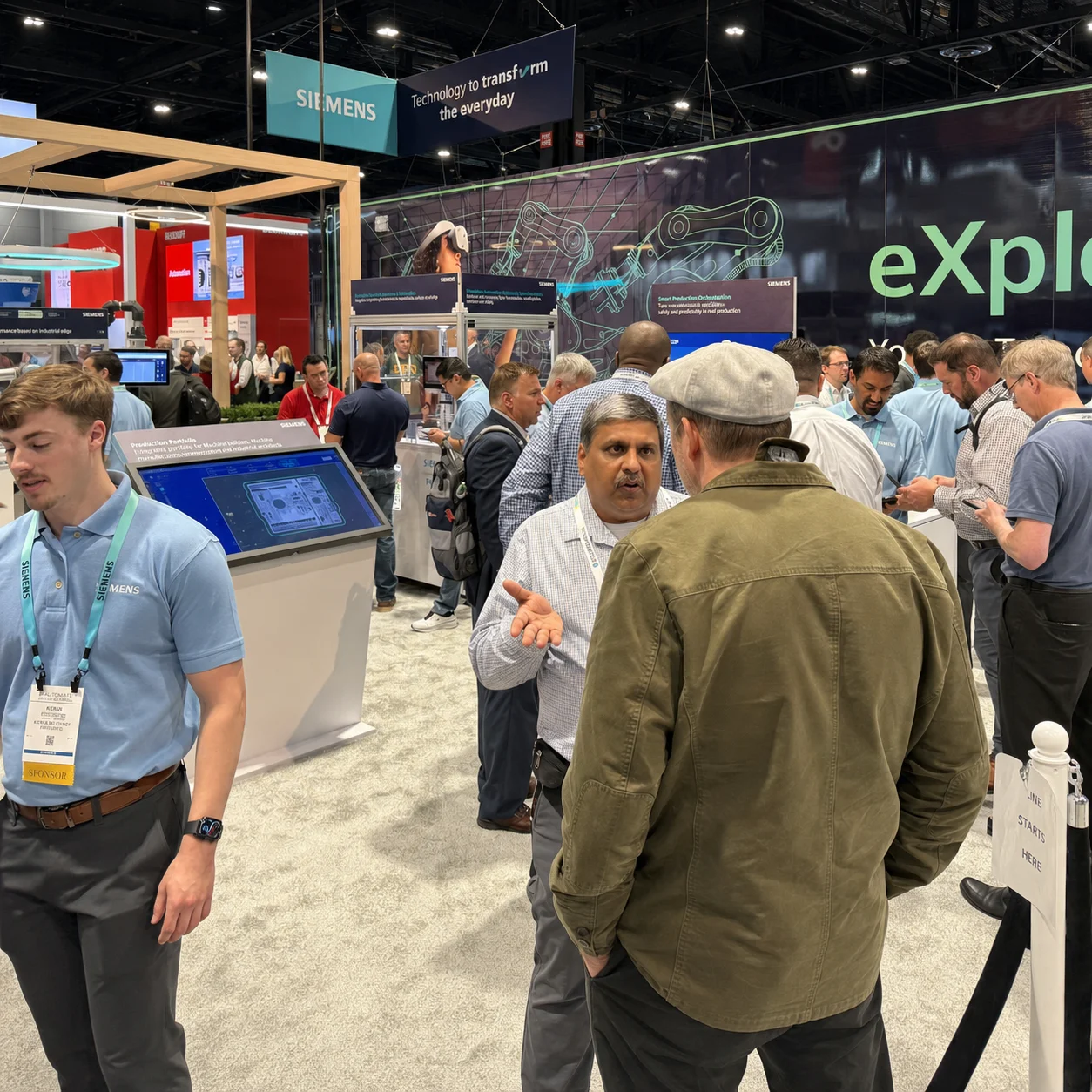 Crowded Siemens booth on the trade show floor