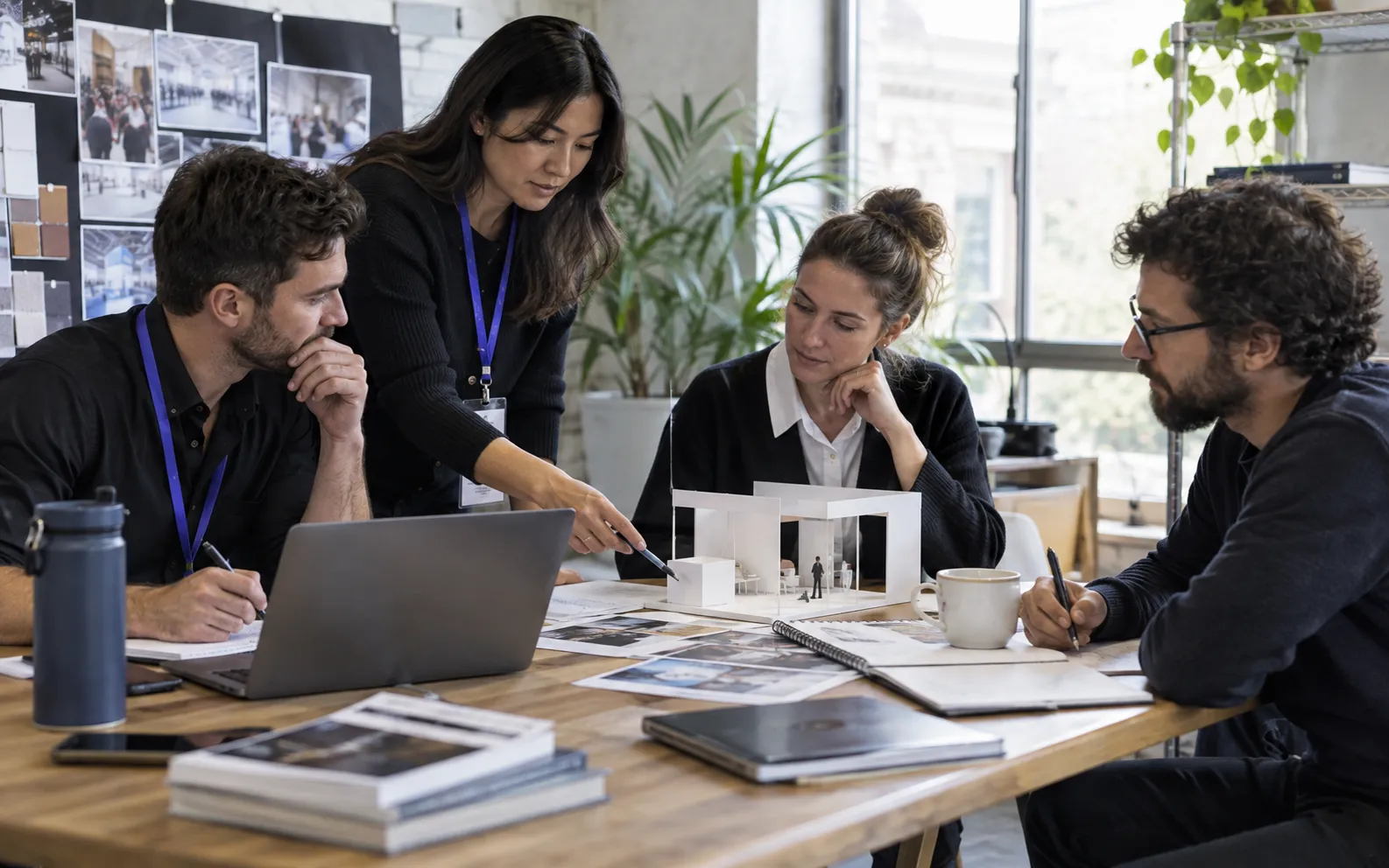 Generated scenario: A small exhibitor marketing team aligns a selected show calendar, company shortlist and sales research brief around a studio table with a simple stand model