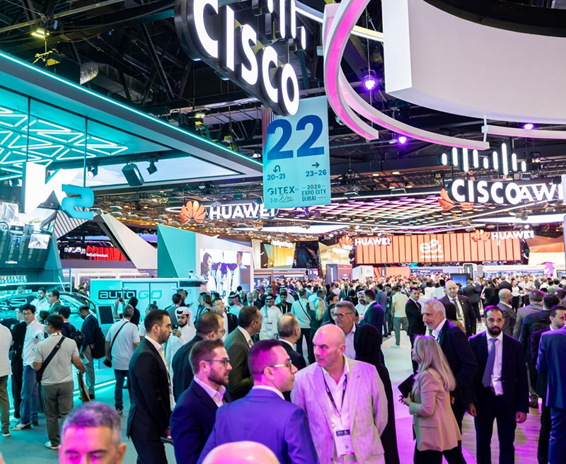 Exhibition crowd and technology booths in a GITEX organizer photograph