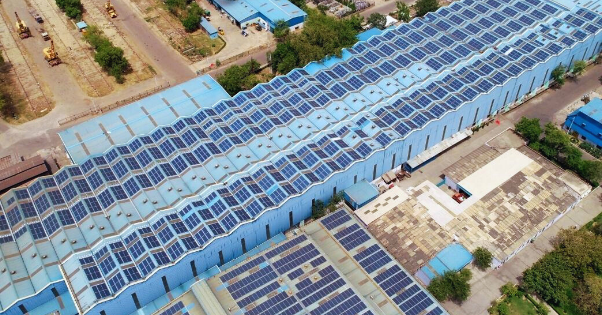 Close-up of commercial rooftop solar panels used to reduce electricity costs