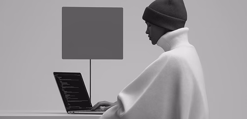 A person working in a Laptop