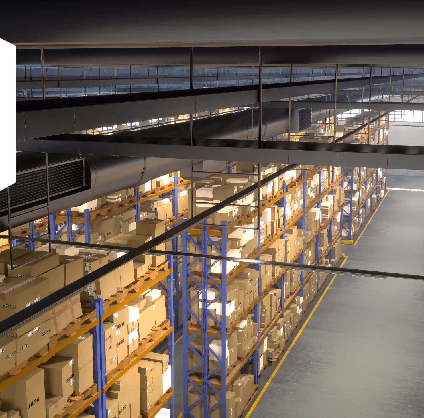 High-angle view of a large warehouse aisle with blue and orange metal shelves stacked with numerous cardboard boxes.