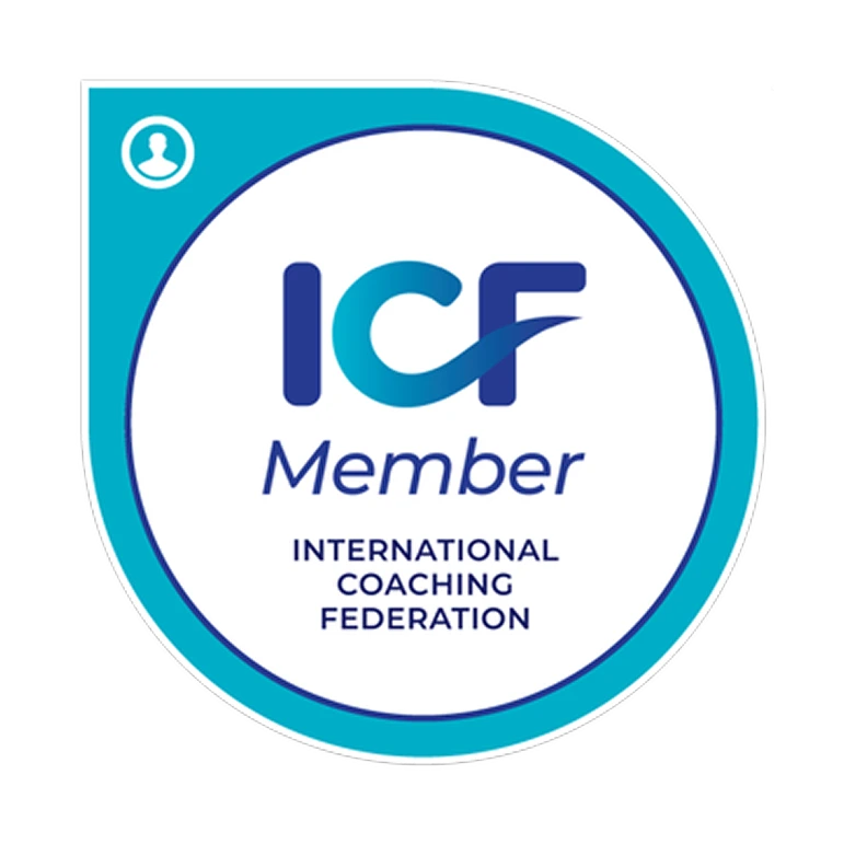 Badge with text ICF Member and International Coaching Federation in blue and teal colors.