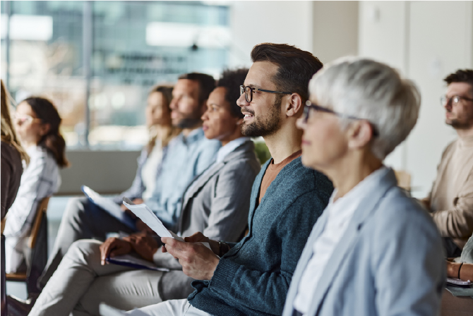 Delegates watching a presentation