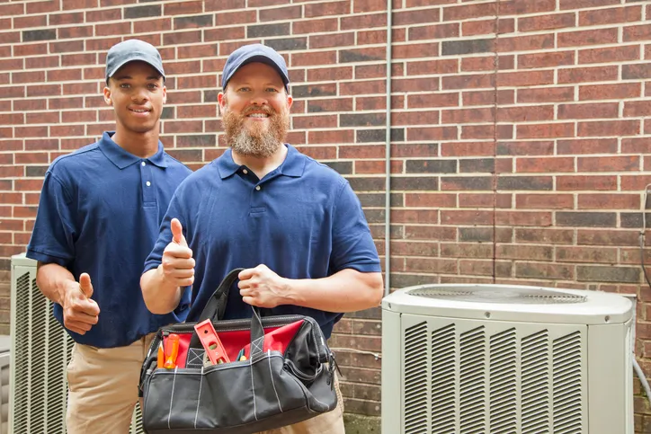 Image of two technician with repairing tool bag