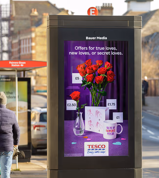 An Adshel Live format displaying a Tesco Valentines campaign with roses