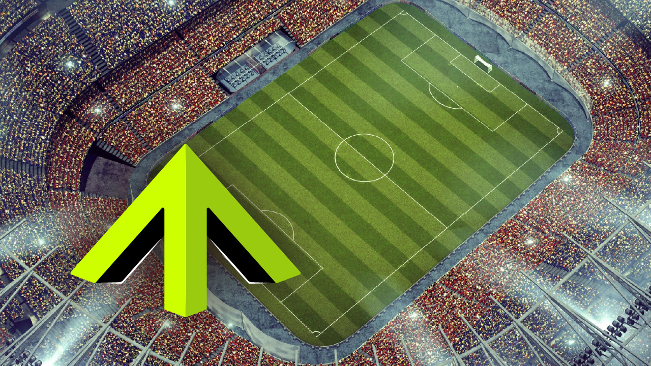 Aerial view of a packed stadium with a soccer field in the center and a large green upward arrow graphic overlay.