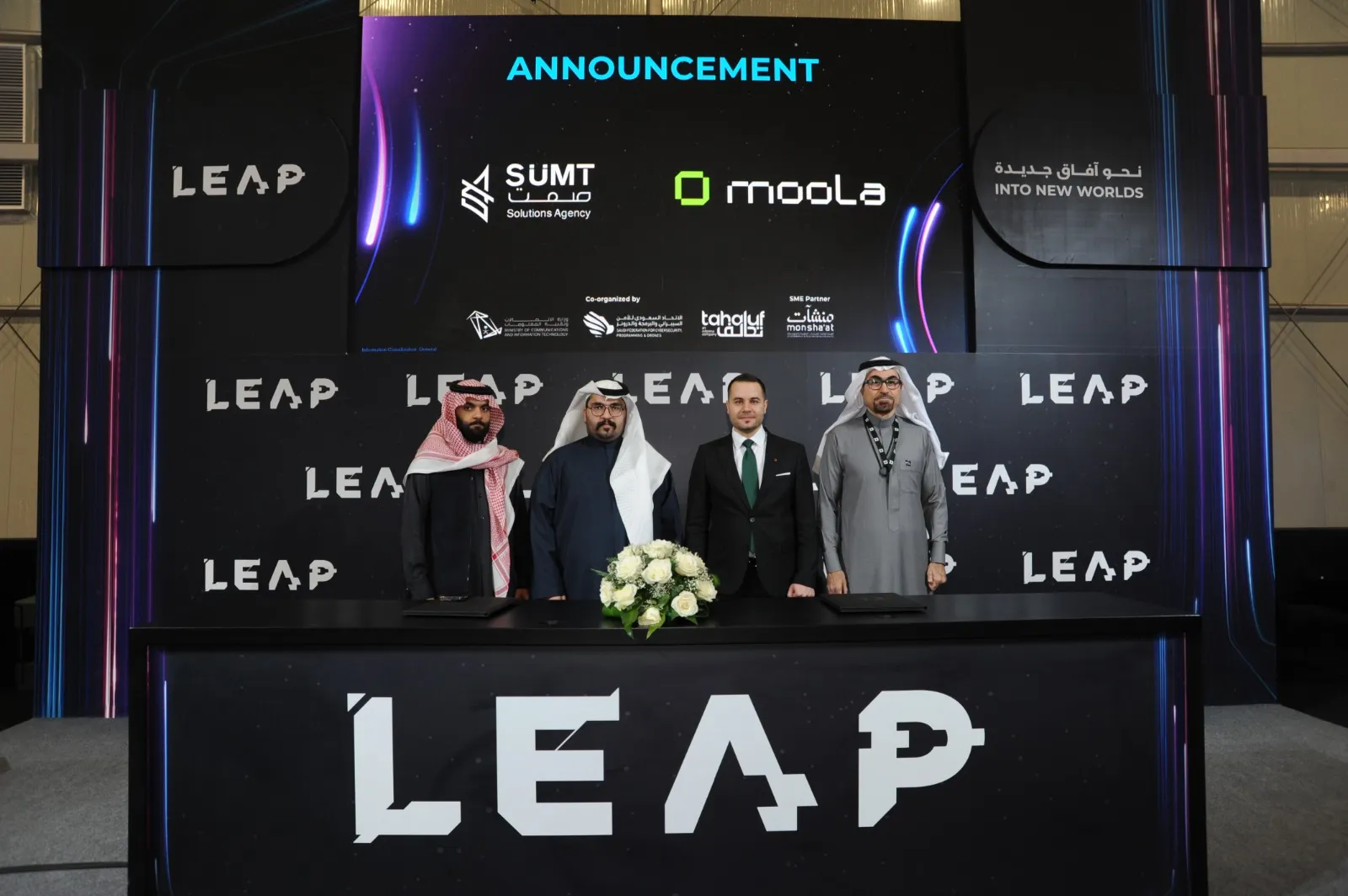 Hands holding a tablet displaying financial data with text highlighting how Bayt Al Jaleed cut manual expense work by 80% and boosted financial transparency by 90% using Moola in 12 weeks.