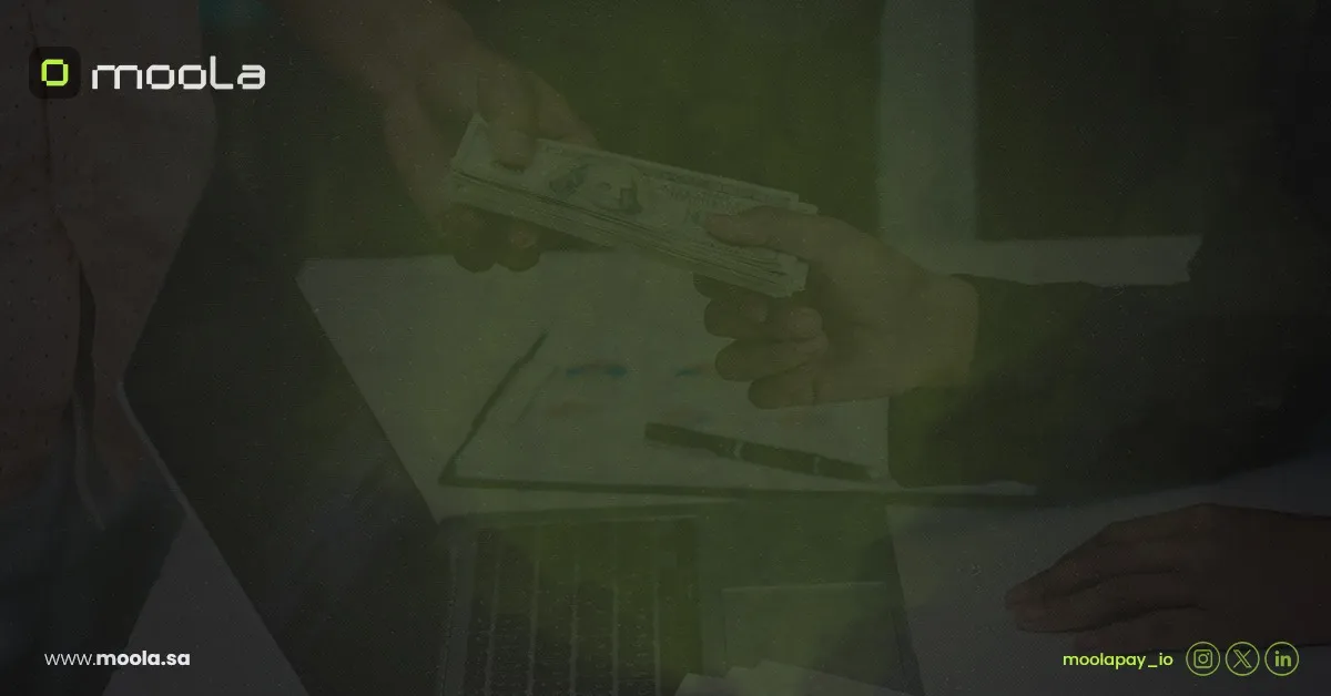 Hands holding a tablet displaying financial data with text highlighting how Bayt Al Jaleed cut manual expense work by 80% and boosted financial transparency by 90% using Moola in 12 weeks.