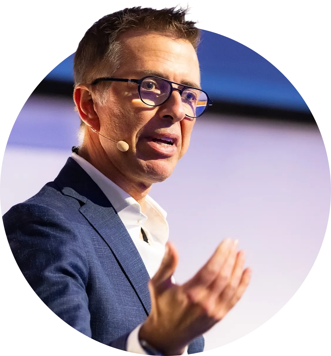 Phil Robinson, CEO of Boardwave, speaking on stage during a presentation.