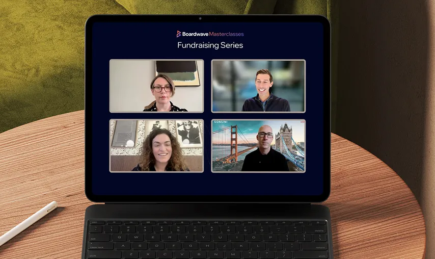 Laptop displaying a Boardwave Masterclasses Fundraising Series video session with four speakers.