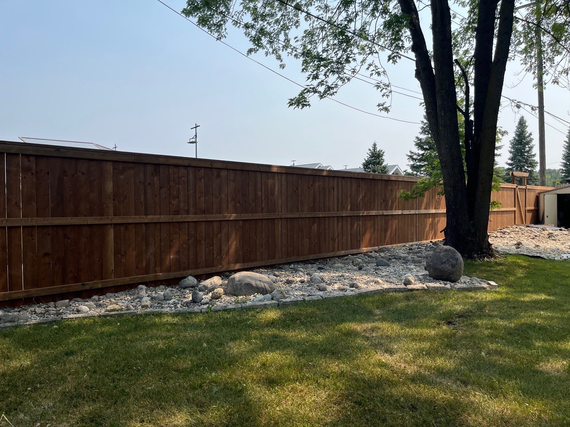 Fence Replacement in winnipeg with existing landscaping