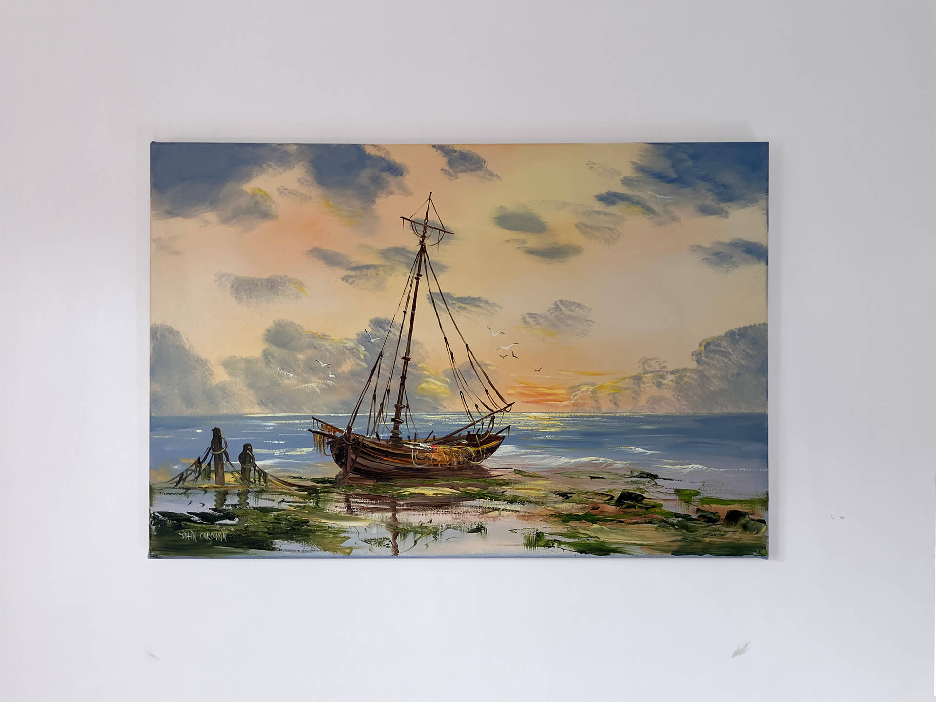 A tranquil scene of a boat on the beach at sunset, showcasing a colorful sky and gentle waves lapping at the shore.A tranquil scene of a boat on the beach at sunset, showcasing a colorful sky and gentle waves lapping at the shore.
