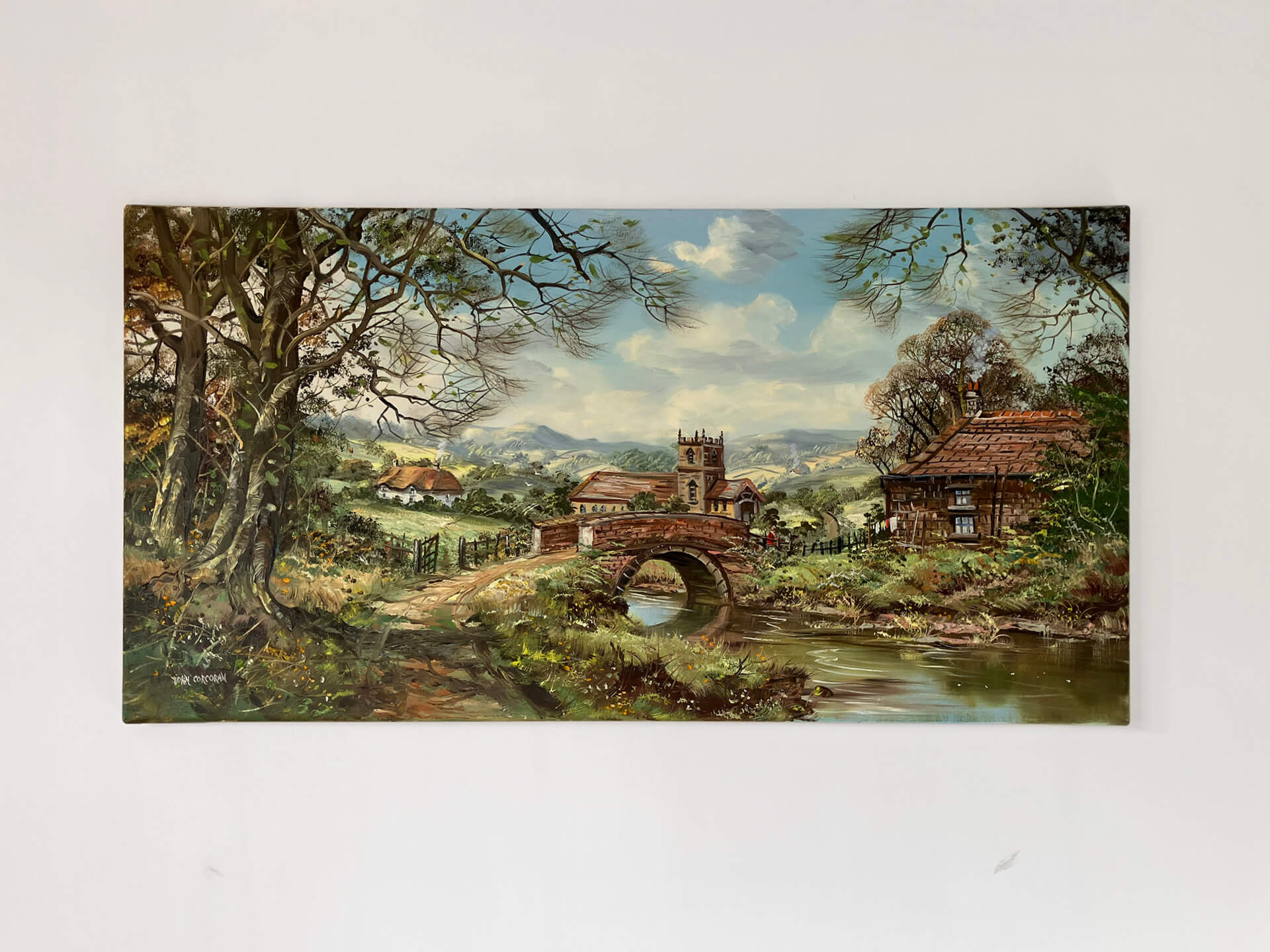 A painting depicting a bridge over a river, surrounded by houses and trees, capturing a serene landscape.