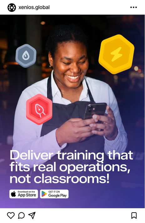 Smiling elderly man in overalls inspecting a plant leaf in a green field under blue sky.