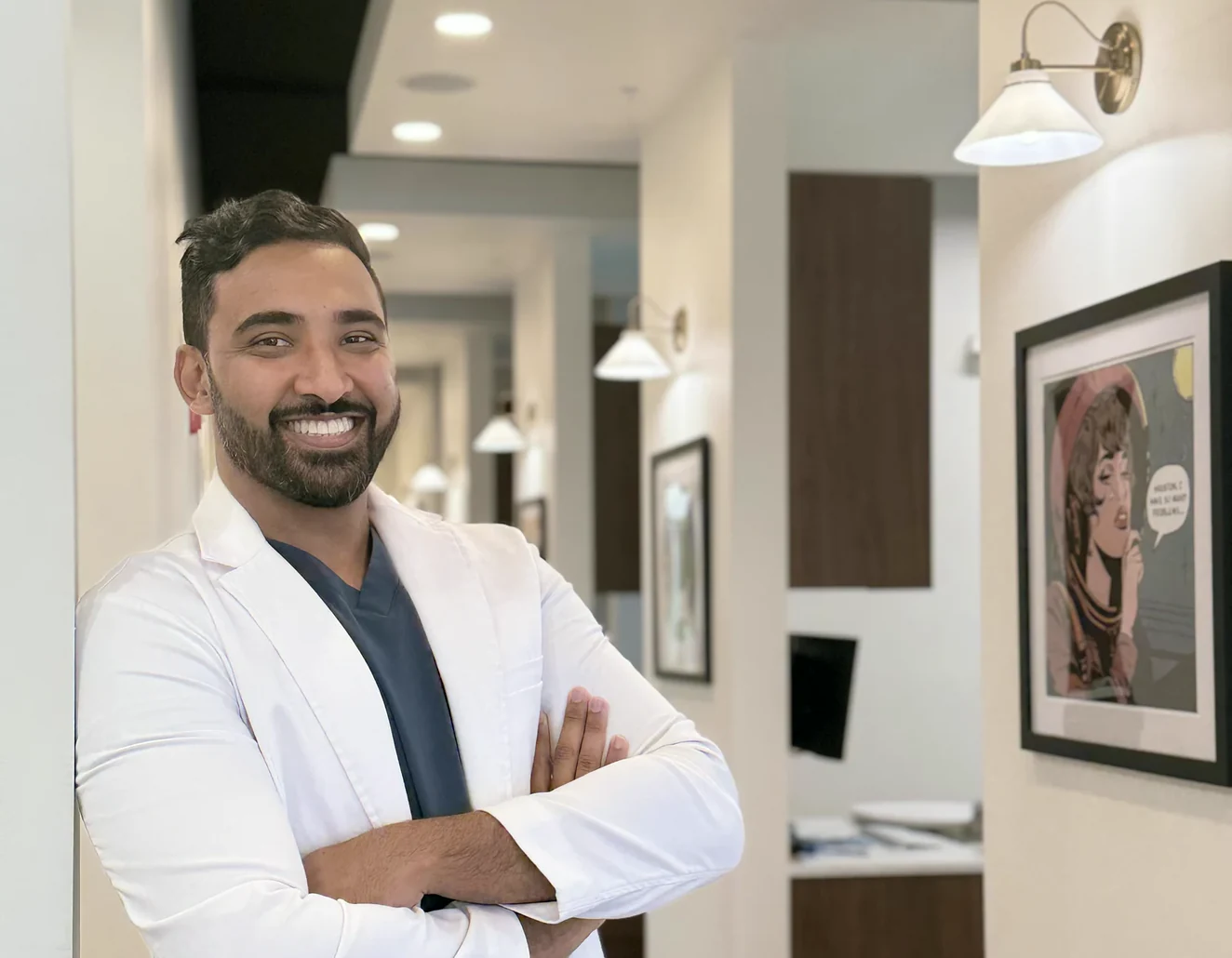 Dr. Sajan Parag welcoming a patient at Rinse Dental