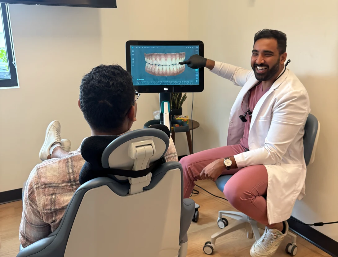 Dr. Sajan Parag explaining a digital Invisalign treatment plan