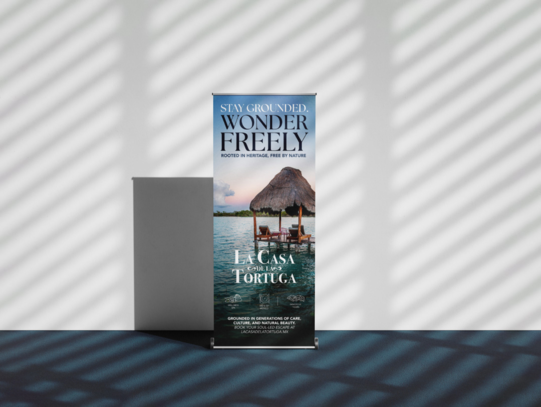 Banner with a tropical waterfront hut and text promoting La Casa de la Tortuga resort, emphasizing wellness and nature-based experiences.