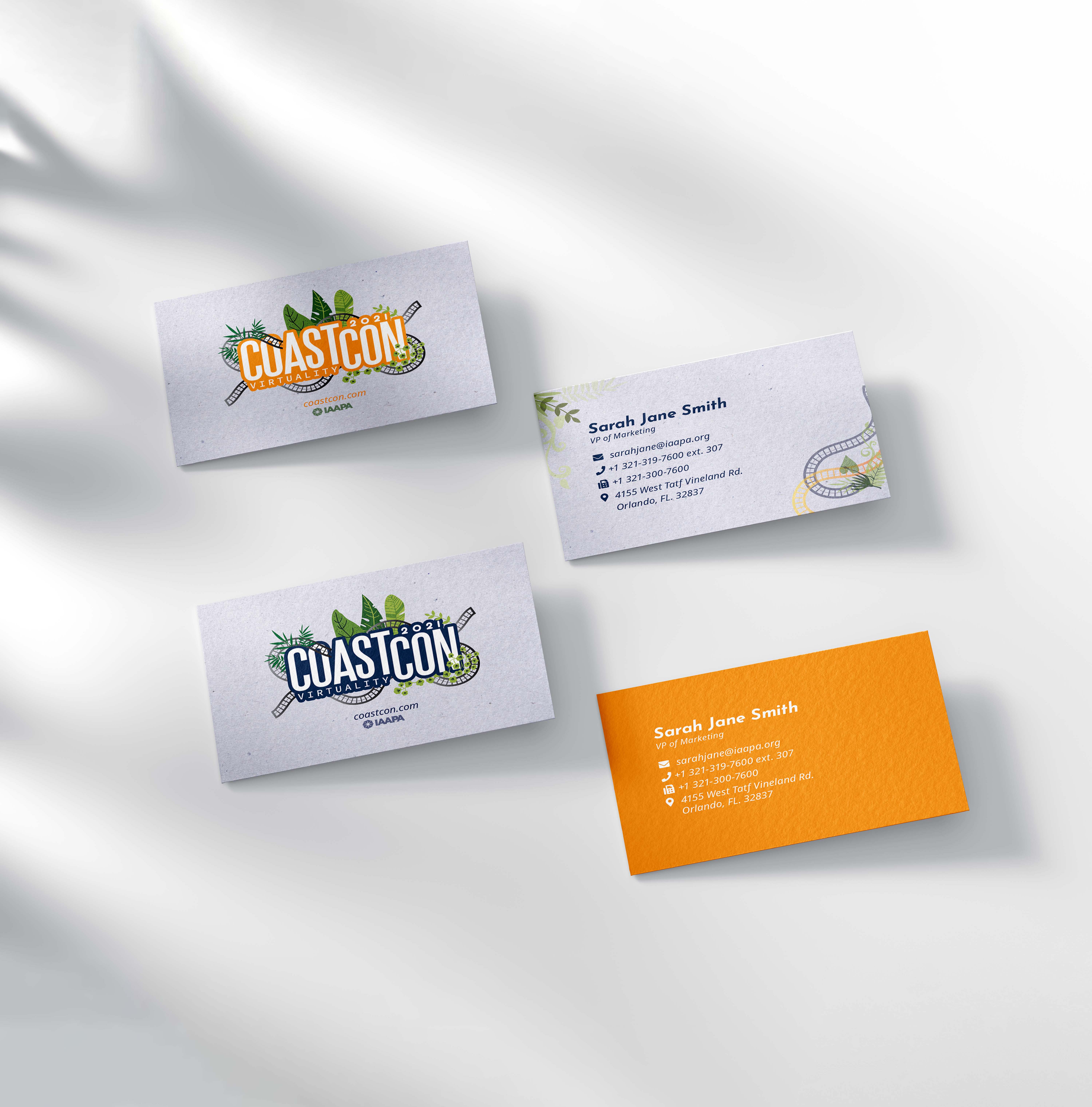 Four CoastCon 2021 business cards showing logo on two cards and contact details for Sarah Jane Smith, VP of Marketing, on white and orange backgrounds.