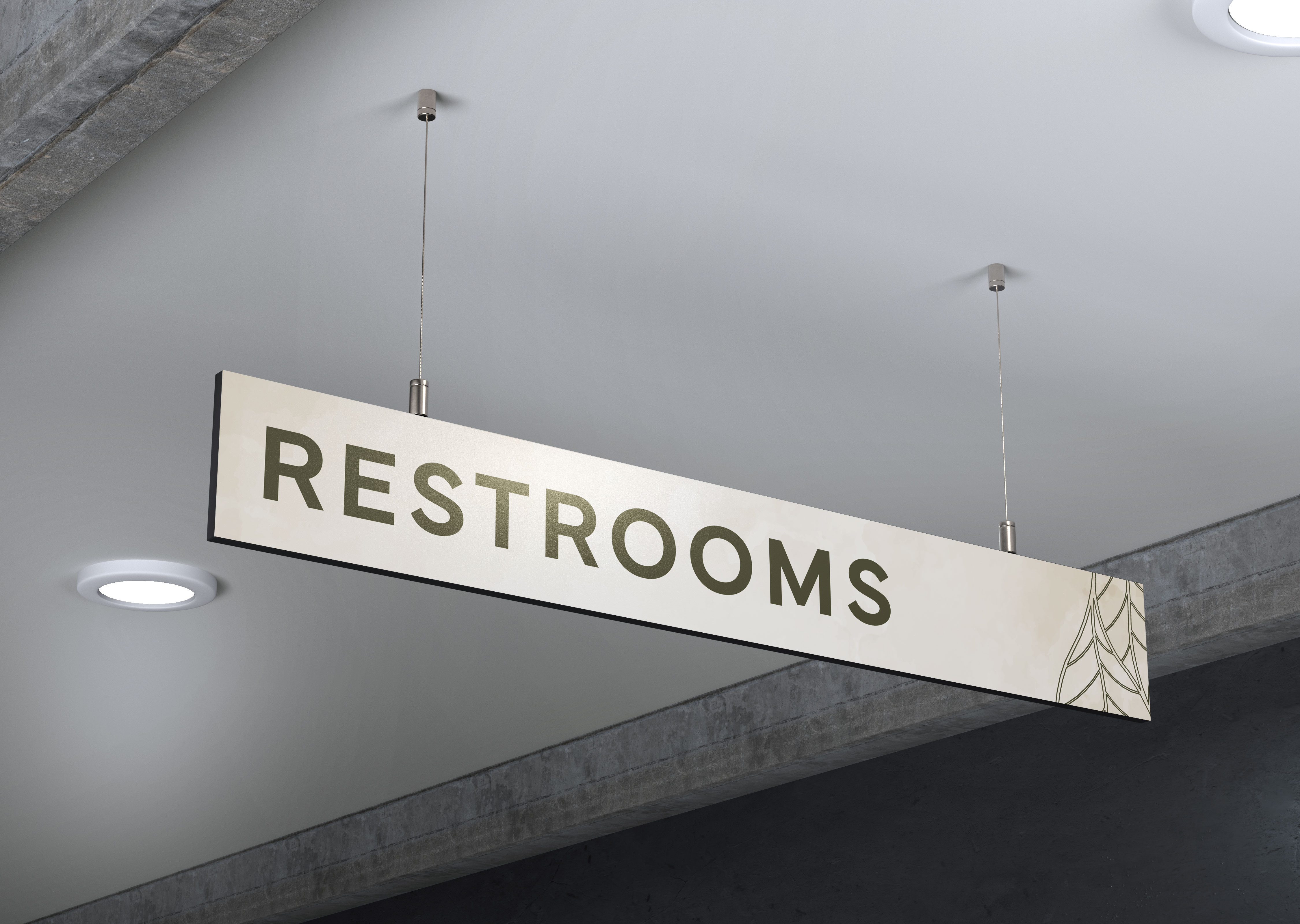 Ceiling-mounted rectangular sign with the word 'RESTROOMS' in bold letters.