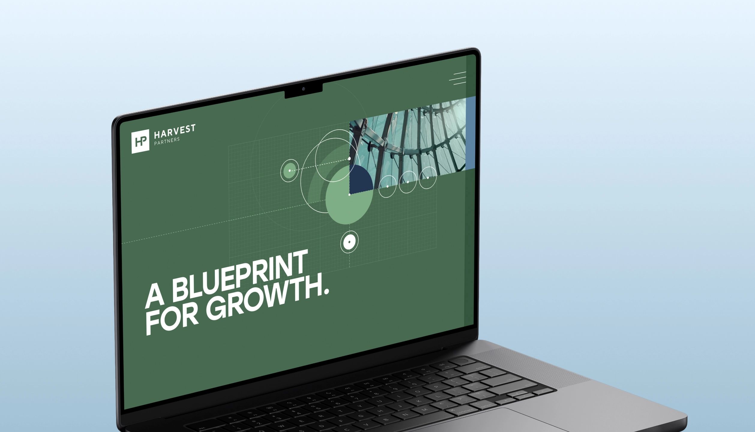 Laptop screen showing a green interface with Harvest Partners logo and the text 'A Blueprint for Growth' alongside geometric shapes.