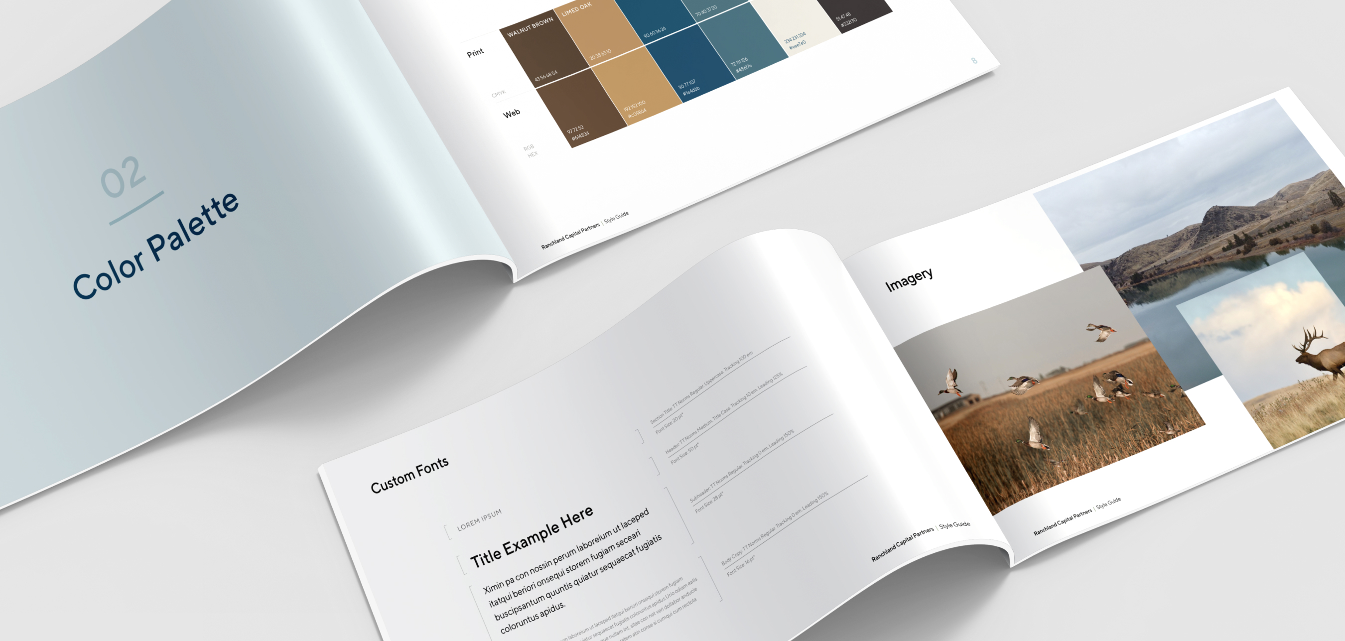 Open style guide booklet pages showing a color palette, custom fonts, and nature imagery with birds, a lake, and a deer.