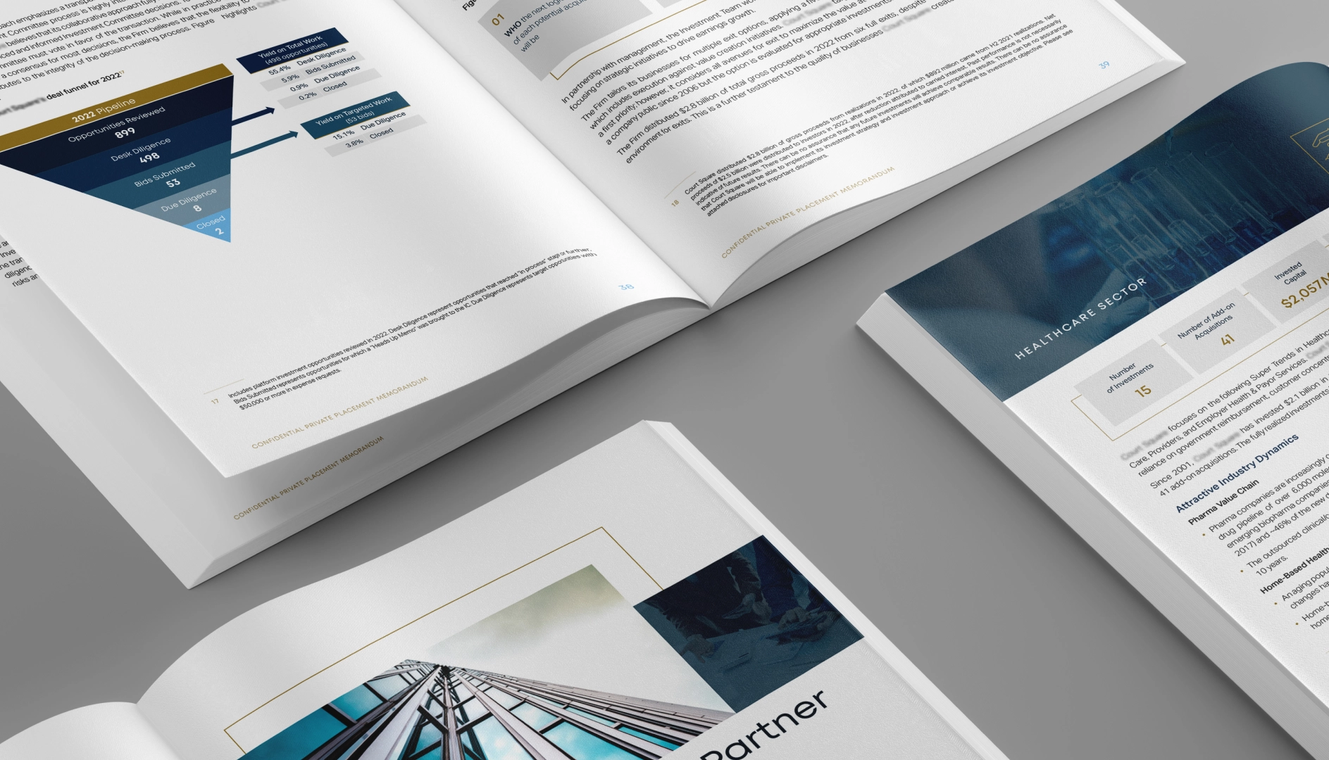 Four open financial report booklets laid out on a gray surface, showing charts, text, and a photo of a modern glass building.