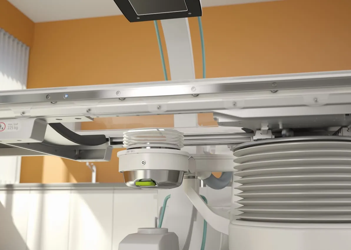 Close-up of the mechanical components beneath a STORZ Medical lithotripsy treatment table