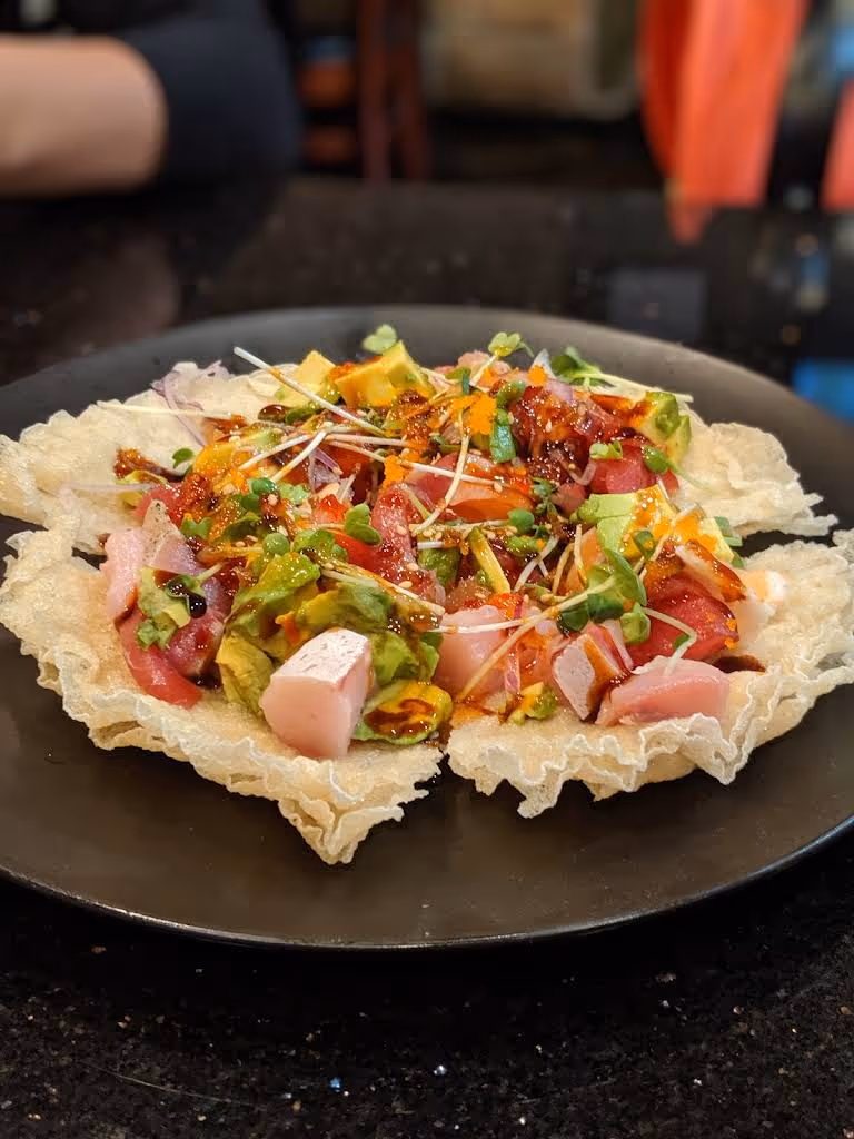 A plate of food with a variety of ingredients.