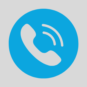 White phone handset icon with sound waves inside a blue circle.