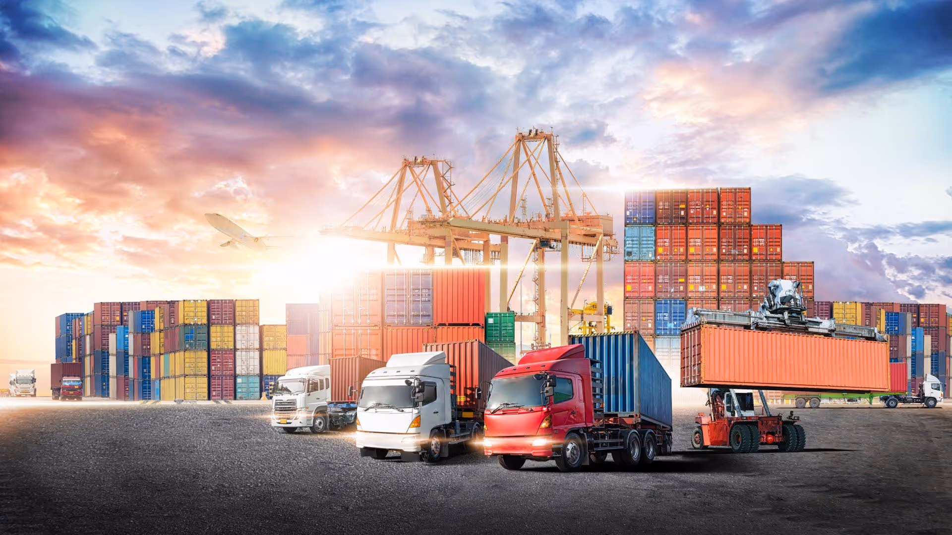 Port with stacked containers and trucks