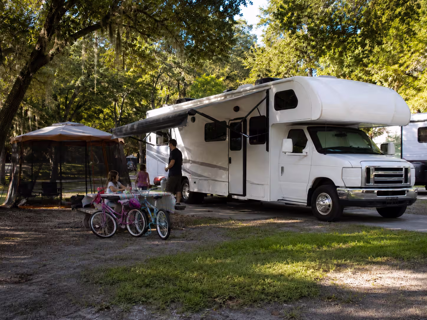 Class C motorhome rental at a family campsite near Orlando