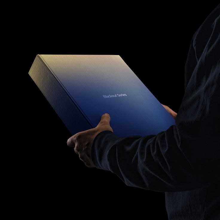 Hands presenting a Berlin Packaging gift box