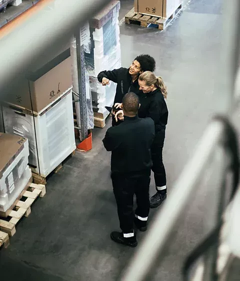 Warehouse team member performing value-added services